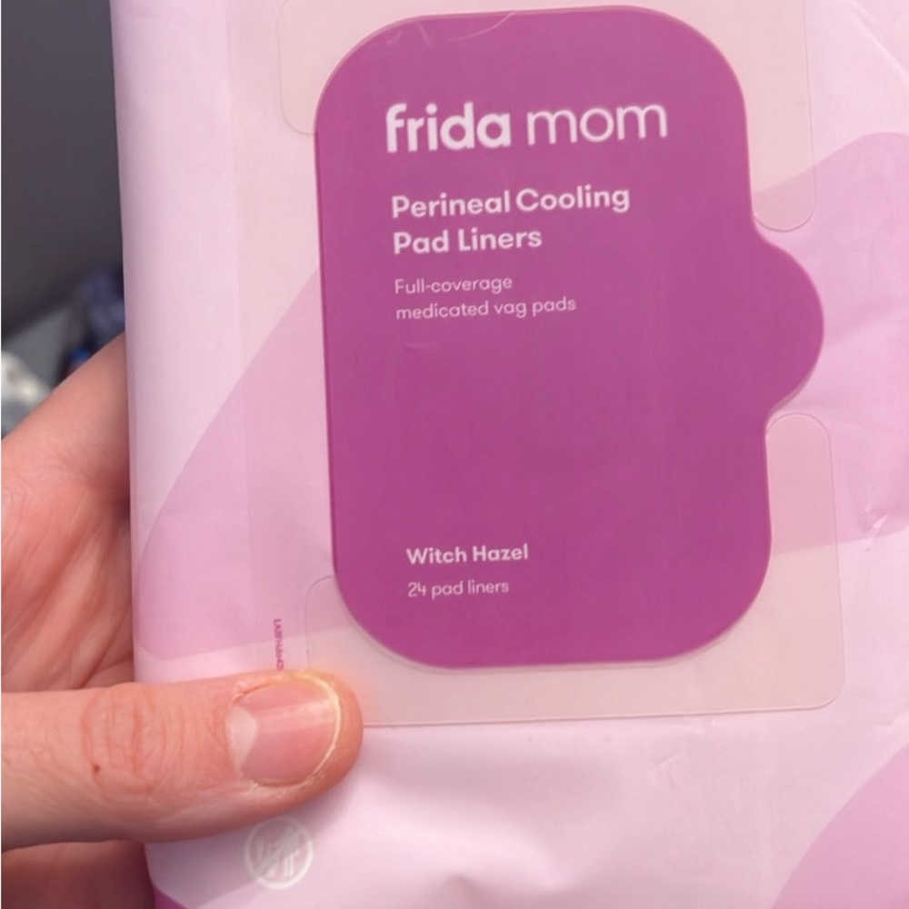Various postpartum supplies. Frida mom